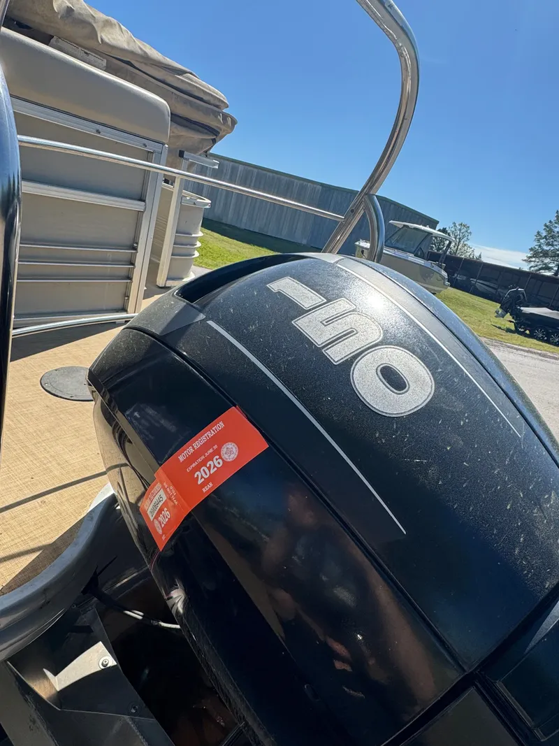 Slide: The Image of Lowe SS250 2016 outboard motor with 2026 registration sticker. - 3