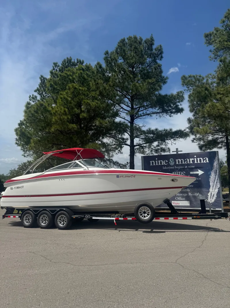 Slide: The Image of 2003 Cobalt 282 boat on trailer at Nine Marina. - 1