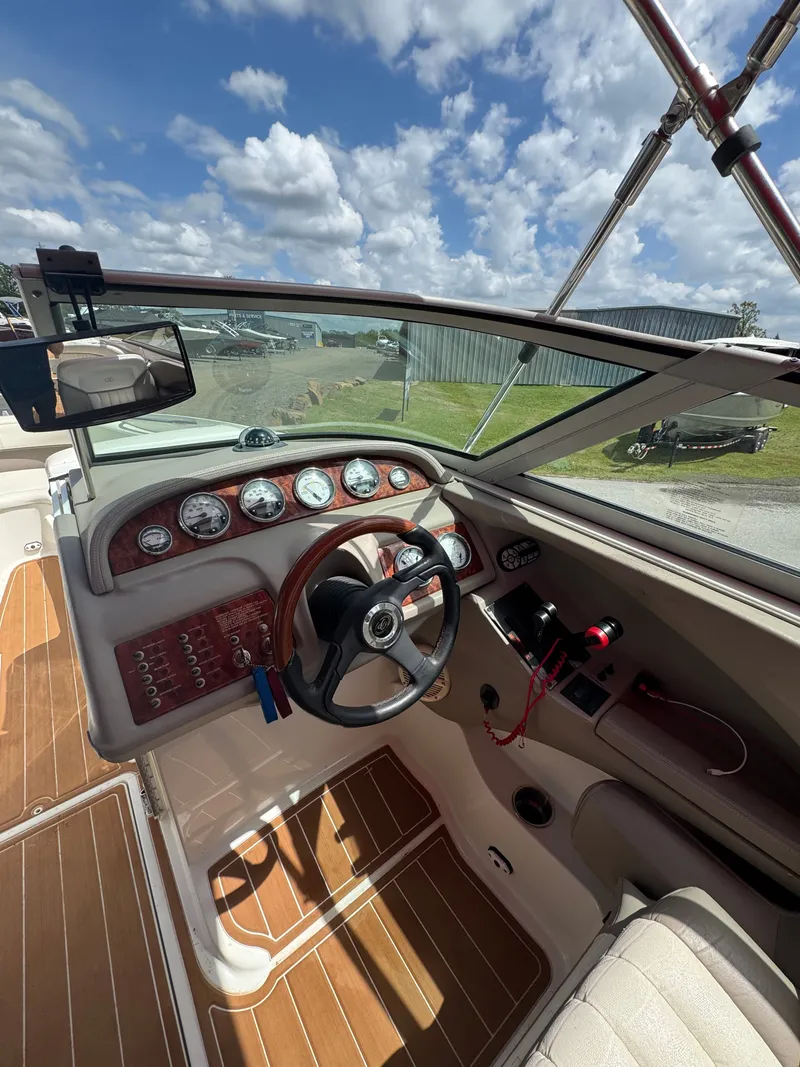 Slide: The Image of Interior view of a 2003 Cobalt 282 boat with wood trim. - 5