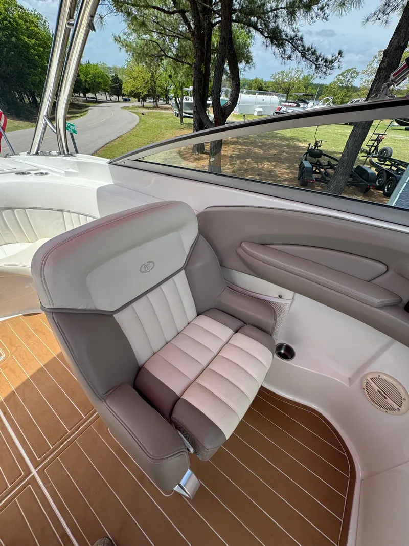 Slide: The Image of Interior of a 2003 Cobalt 282 boat with gray seating. - 8