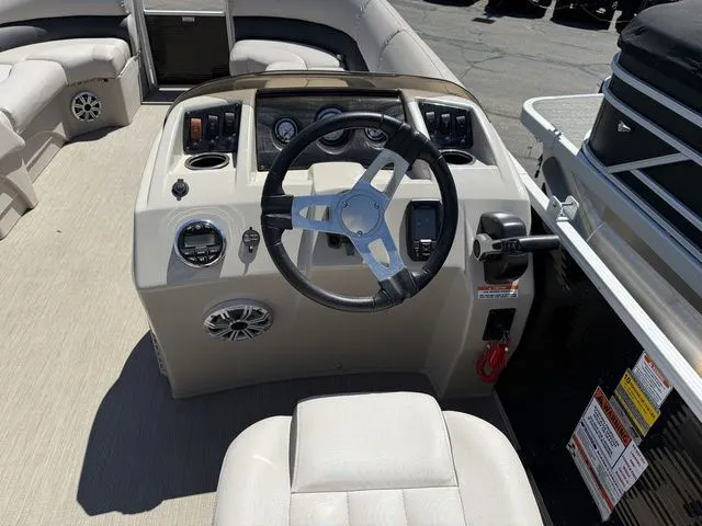 Slide: The Image of Interior view of 2017 Bennington 21SLX helm with steering wheel. - 11