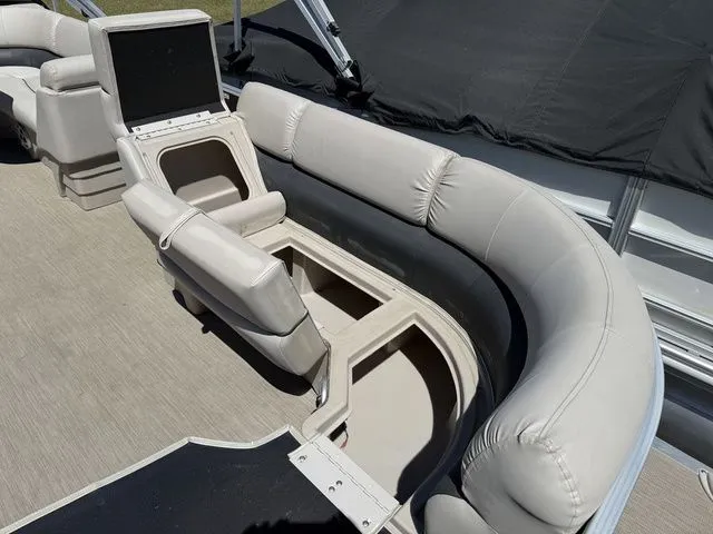 Slide: The Image of Interior of a 2017 Bennington 21SLX pontoon boat with under-seat storage. - 8