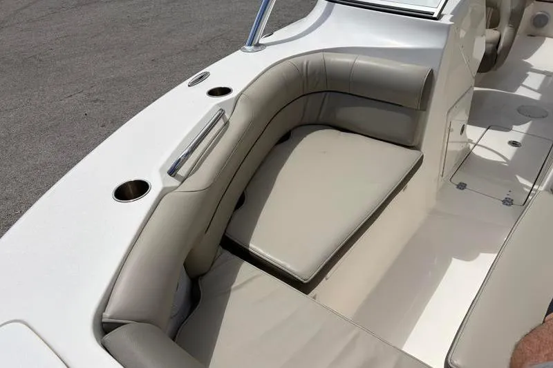 Slide: The Image of 2024 Key West 239 DFS boat interior with seating and control panel. - 19
