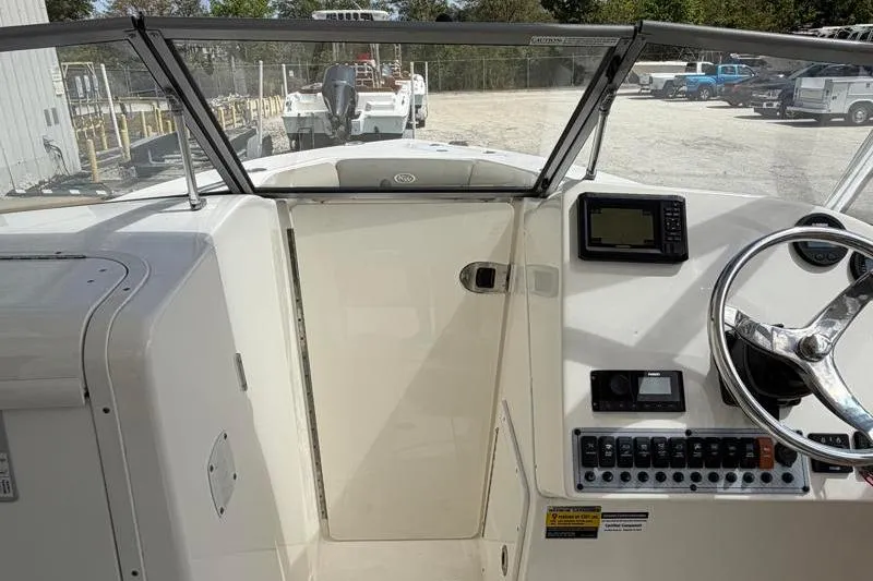 Slide: The Image of Garmin navigation system on 2024 Key West 239 DFS boat dashboard. - 22