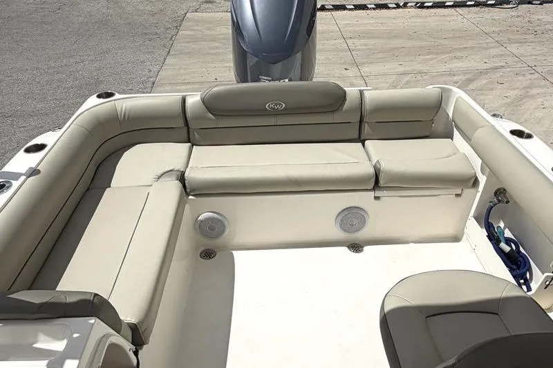 Slide: The Image of Blue hose and nozzle in a 2024 Key West 239 DFS boat compartment. - 33