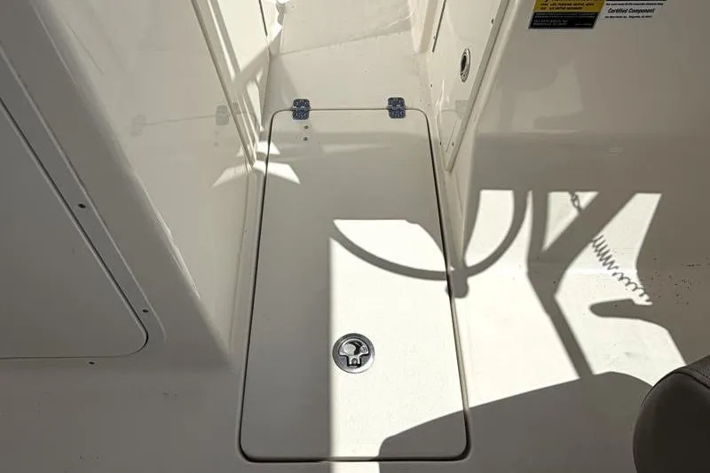 Slide: The Image of 2024 Key West 239 DFS boat speakers and canopy against a blue sky backdrop. - 37