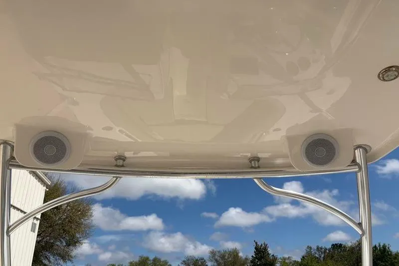 Slide: The Image of 2024 Key West 239 DFS boat trailer with visible contact number in parking lot. - 39