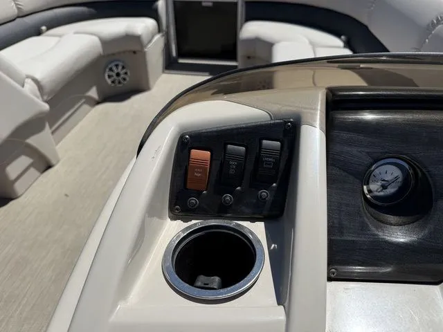 Slide: The Image of Interior view of a 2017 Bennington 21SLX boat with control console. - 13