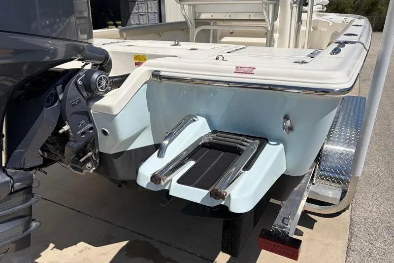 Slide: The Image of 2024 Key West 210 Bay Reef boat with motor and swim platform. - 14