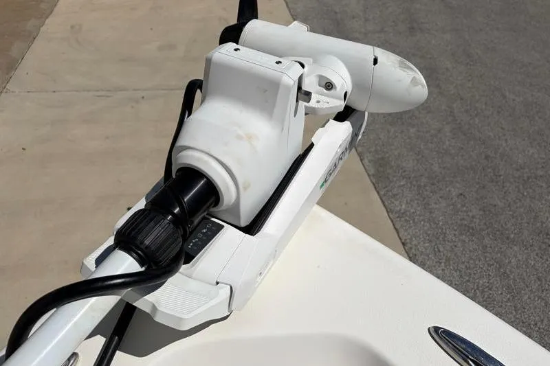 Slide: The Image of 2024 Key West 210 Bay Reef boat with mounted trolling motor. - 19