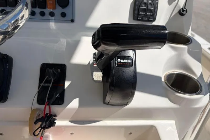 Slide: The Image of Close-up of 2024 Key West 210 Bay Reef boat controls with Yamaha throttle. - 32