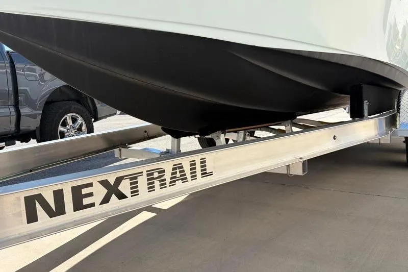 Slide: The Image of 2024 Key West 210 Bay Reef boat on NexTrail trailer, close-up view. - 41