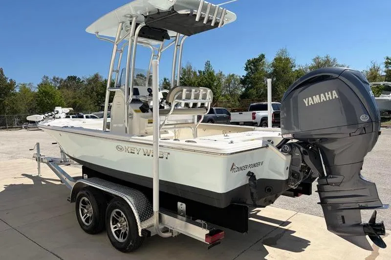 Slide: The Image of 2024 Key West 210 Bay Reef boat with Yamaha outboard engine on trailer. - 5