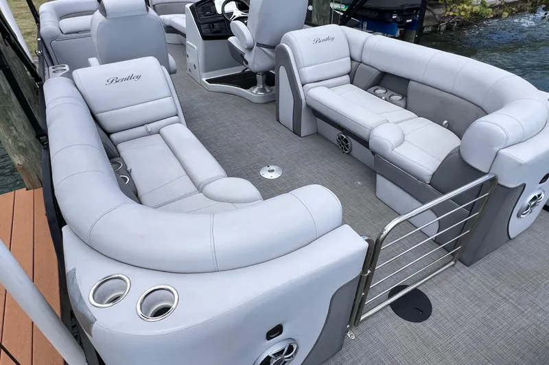 Slide: The Image of Luxurious interior of 2023 Bentley Pontoons 250 Elite Admiral with plush seating and modern design. - 10