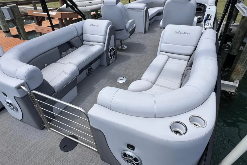 Slide: The Image of 2023 Bentley Pontoons 250 Elite Admiral with luxurious seating and modern design. - 11