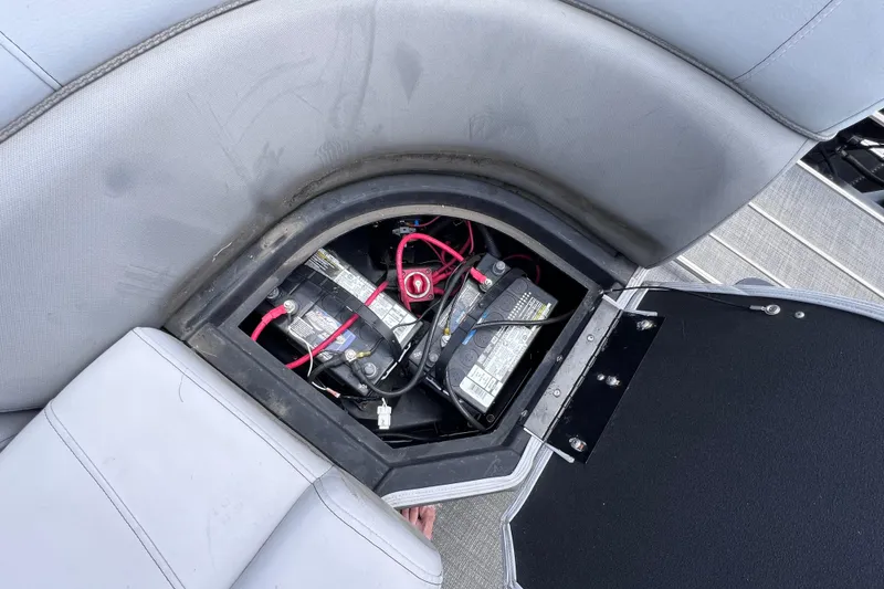 Slide: The Image of Battery compartment of 2023 Bentley Pontoons 250 Elite Admiral, showcasing wiring and connections. - 16