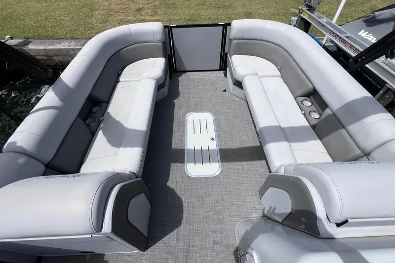 Slide: The Image of 2023 Bentley Pontoons 250 Elite Admiral interior with spacious seating and modern design. - 25