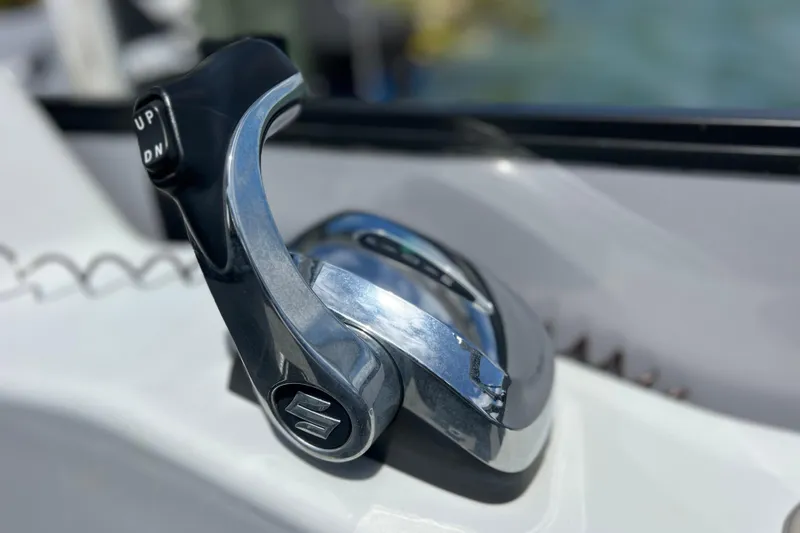 Slide: The Image of Throttle control lever on a 2023 Bentley Pontoons 250 Elite Admiral boat. - 32