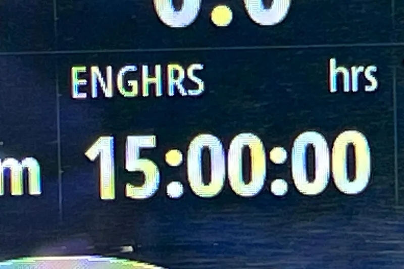Slide: The Image of Digital display showing 15 engine hours on 2023 Bentley Pontoons 250 Elite Admiral. - 39