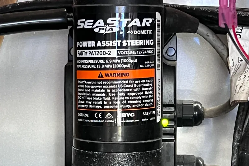 Slide: The Image of SeaStar power assist steering unit for Bentley Pontoons 250 Elite Admiral 2023 model. - 44