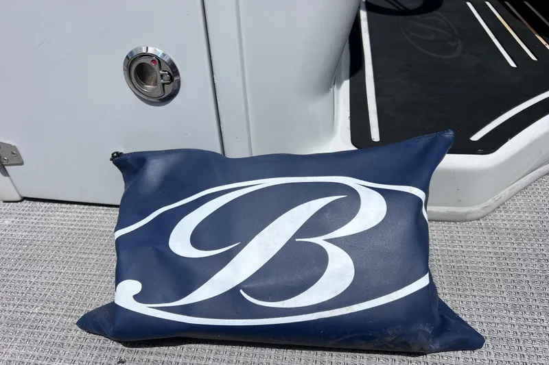Slide: The Image of Blue Bentley Pontoons bag on 2023 Bentley 250 Elite Admiral boat deck. - 45