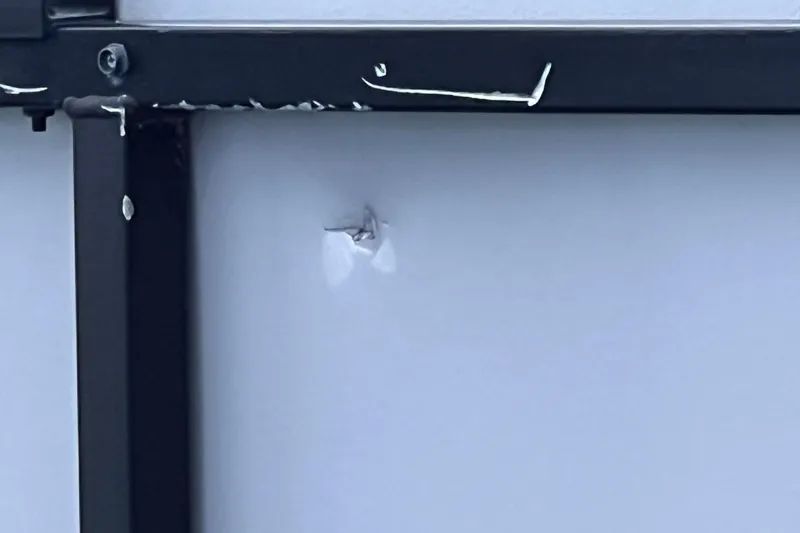 Slide: The Image of Damaged panel on 2023 Bentley Pontoons 250 Elite Admiral boat. - 49