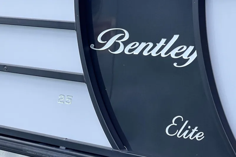 Slide: The Image of 2023 Bentley Pontoons 250 Elite Admiral logo detail on boat exterior. - 5