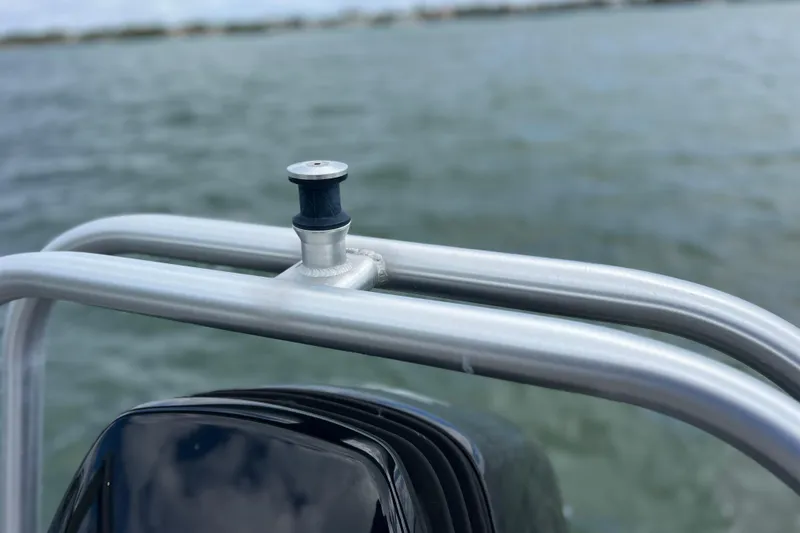 Slide: The Image of Close-up of 2023 Bentley Pontoons 250 Elite Admiral railing on water. - 9
