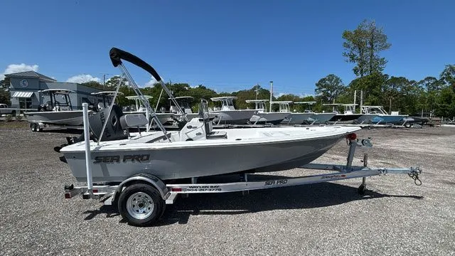 The Image of 2026 Sea Pro 172 Bay boat on trailer outdoors. - 1