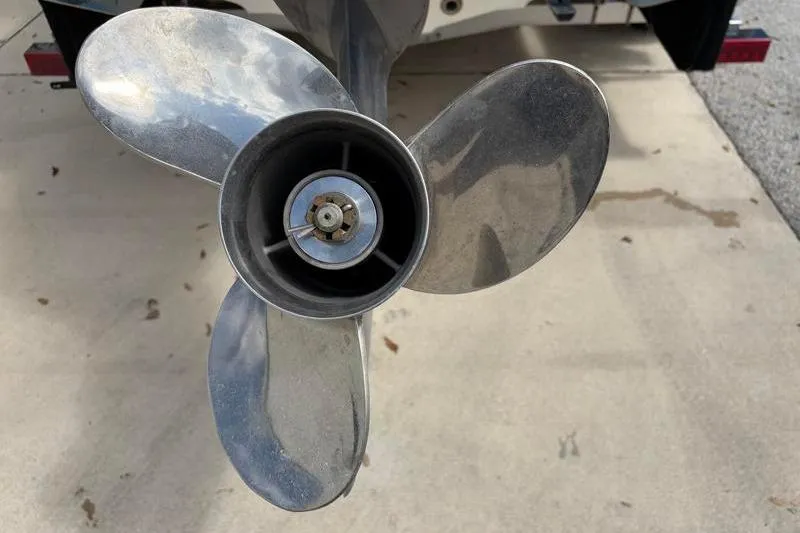 Slide: The Image of Propeller of 2025 Key West 210 Bay Reef boat on concrete surface. - 17