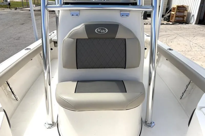 Slide: The Image of 2025 Key West 210 Bay Reef boat seat with gray upholstery and KW logo. - 27