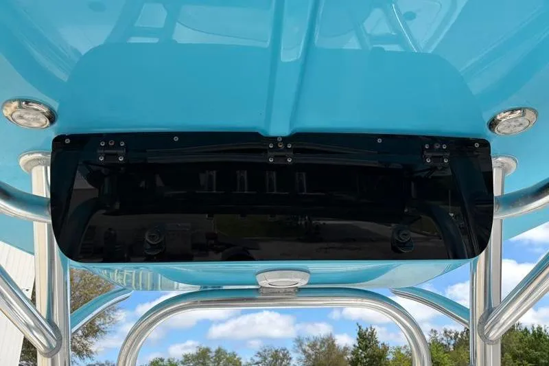 Slide: The Image of 2025 Key West 210 Bay Reef boat underside with blue hull and stainless steel fittings. - 36