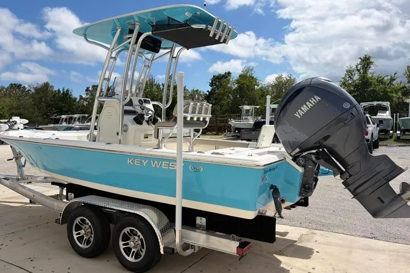 Slide: The Image of 2025 Key West 210 Bay Reef boat with Yamaha engine on trailer. - 5