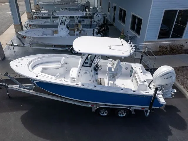 Slide: The Image of 2026 Sportsman Open 232 Center Console boat on trailer. - 11
