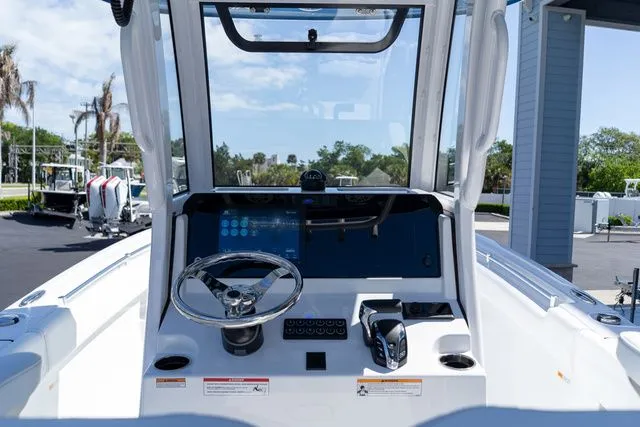 Slide: The Image of 2026 Sportsman Open 232 Center Console helm with modern electronics. - 25