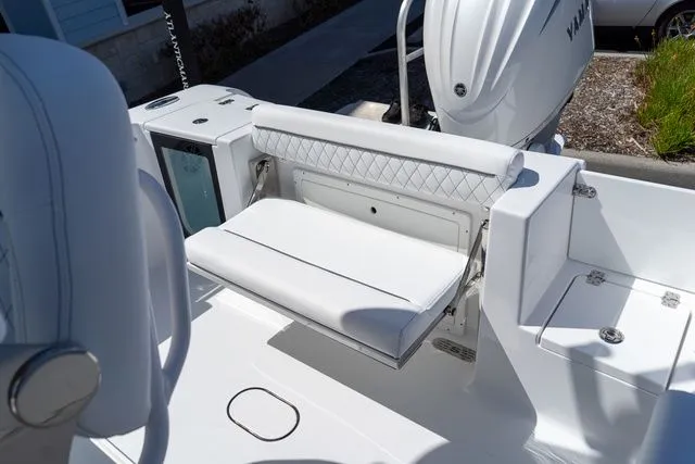 Slide: The Image of 2026 Sportsman Open 232 Center Console with white seating area. - 28