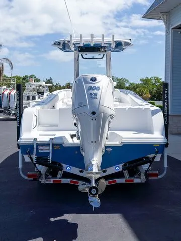 Slide: The Image of 2026 Sportsman Open 232 Center Console boat, rear view, on trailer. - 7