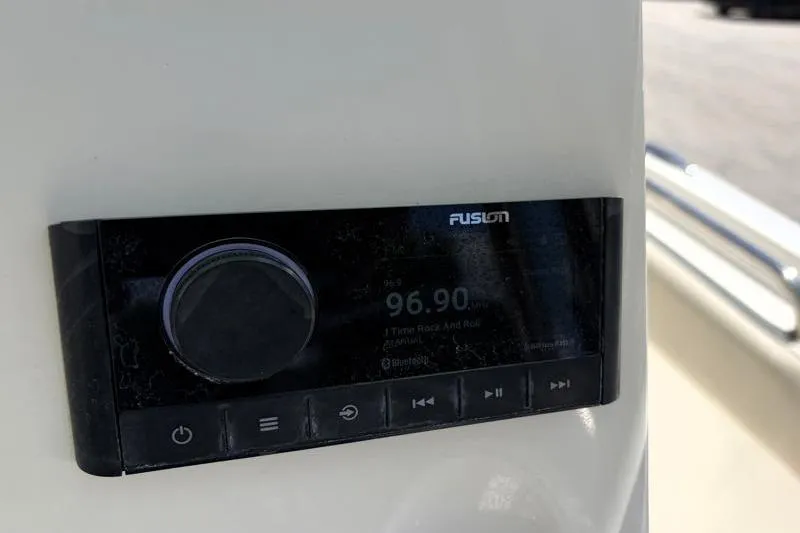 Slide: The Image of Fusion stereo system on 2024 Key West 203 FS boat dashboard. - 31