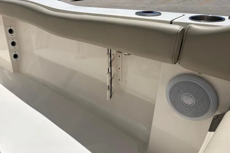 Slide: The Image of 2024 Key West 203 FS boat interior with speaker and cup holders. - 39