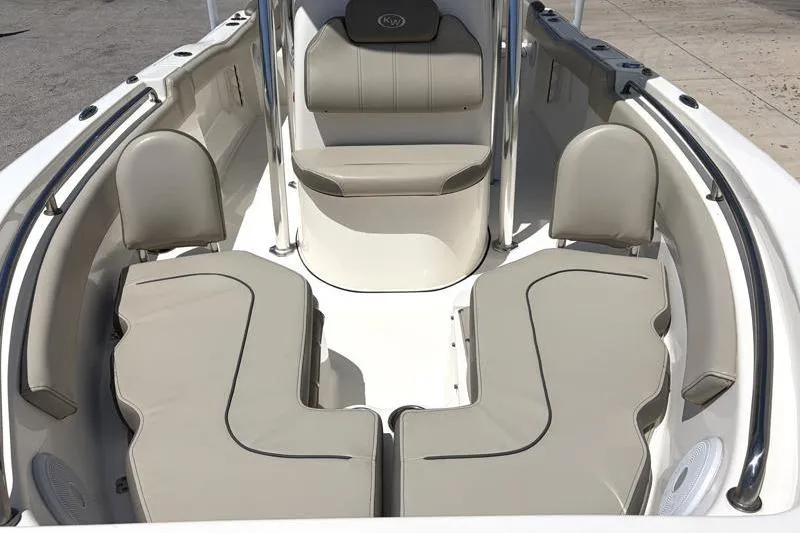 Slide: The Image of 2024 Key West 203 FS boat interior with beige seating and sleek design. - 8