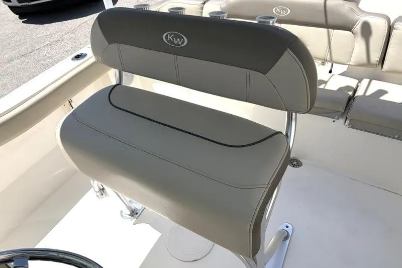 Slide: The Image of 2024 Key West 203 FS boat seating with KW logo, featuring sleek design and comfortable upholstery. - 26