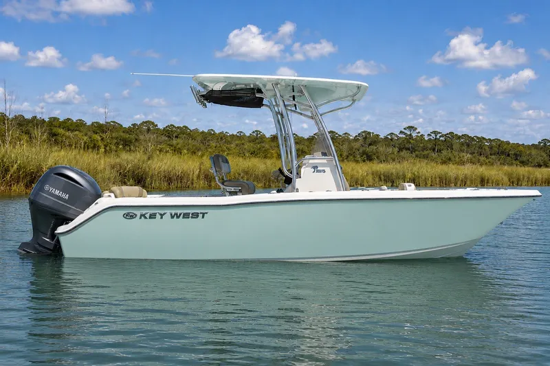 The Image of 2024 Key West 203 FS boat on calm water with Yamaha engine. - 0