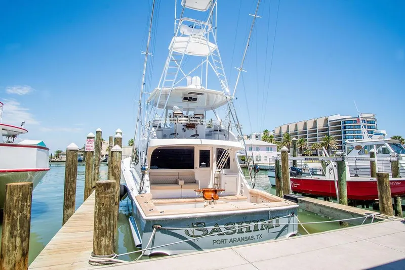 Slide: The Image of 2014 Hatteras 63 GT yacht docked in sunny marina, Port Aransas, Texas. - 25
