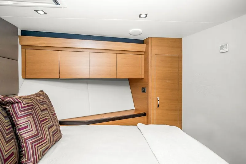 Slide: The Image of Luxurious cabin interior of 2014 Hatteras 63 GT yacht with modern wood finishes. - 33