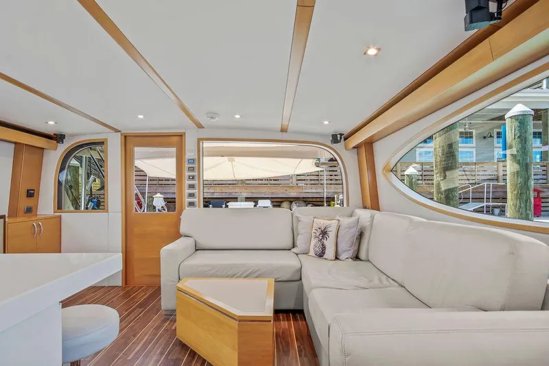 Slide: The Image of Luxurious interior of 2014 Hatteras 63 GT yacht with modern furnishings. - 38
