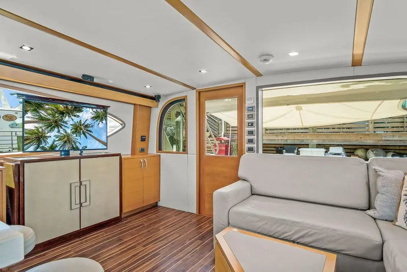 Slide: The Image of Luxurious interior of 2014 Hatteras 63 GT yacht with modern furnishings. - 39