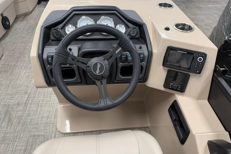 Slide: The Image of 2026 Bentley Pontoons Legacy 243 Swingback dashboard with steering wheel and controls. - 4