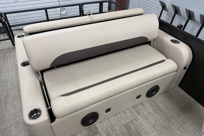 Slide: The Image of 2026 Bentley Pontoons Legacy 243 Swingback seating with cup holders and speaker system. - 6
