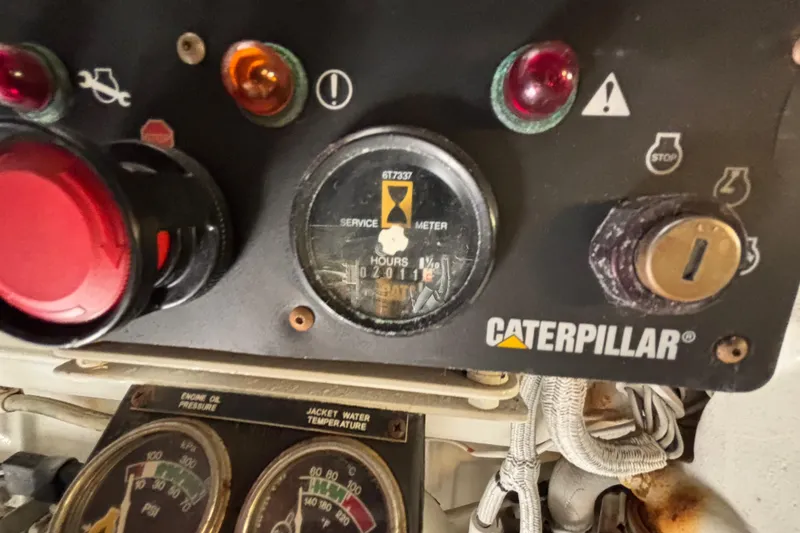 Slide: The Image of Caterpillar engine control panel on 2001 Sea Ray 560 Sedan Bridge yacht. - 42