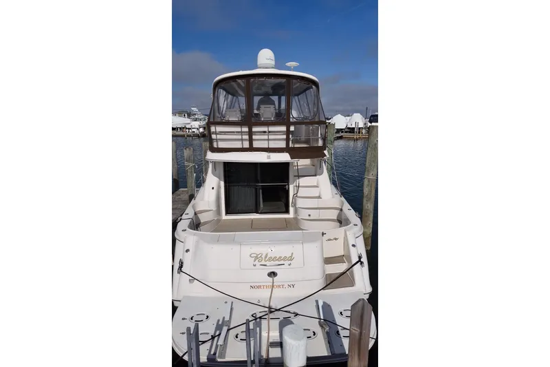 Slide: The Image of 2001 Sea Ray 560 Sedan Bridge yacht docked in Northport, NY marina. - 5
